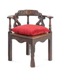 A William and Mary Carved Oak Corner Chair