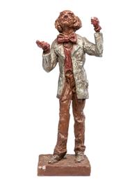 A Carved and Painted Plaster Folk Art Sculpture of a Standing Man