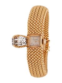 MOVADO, 14K YELLOW GOLD, DIAMOND AND SAPPHIRE SURPRISE WRISTWATCH