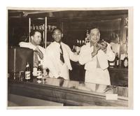 [PHOTOGRAPHY]. HARRIS, Charles "Teenie," (1908-1998). Photograph of a trio of bartenders. Ca 1950.