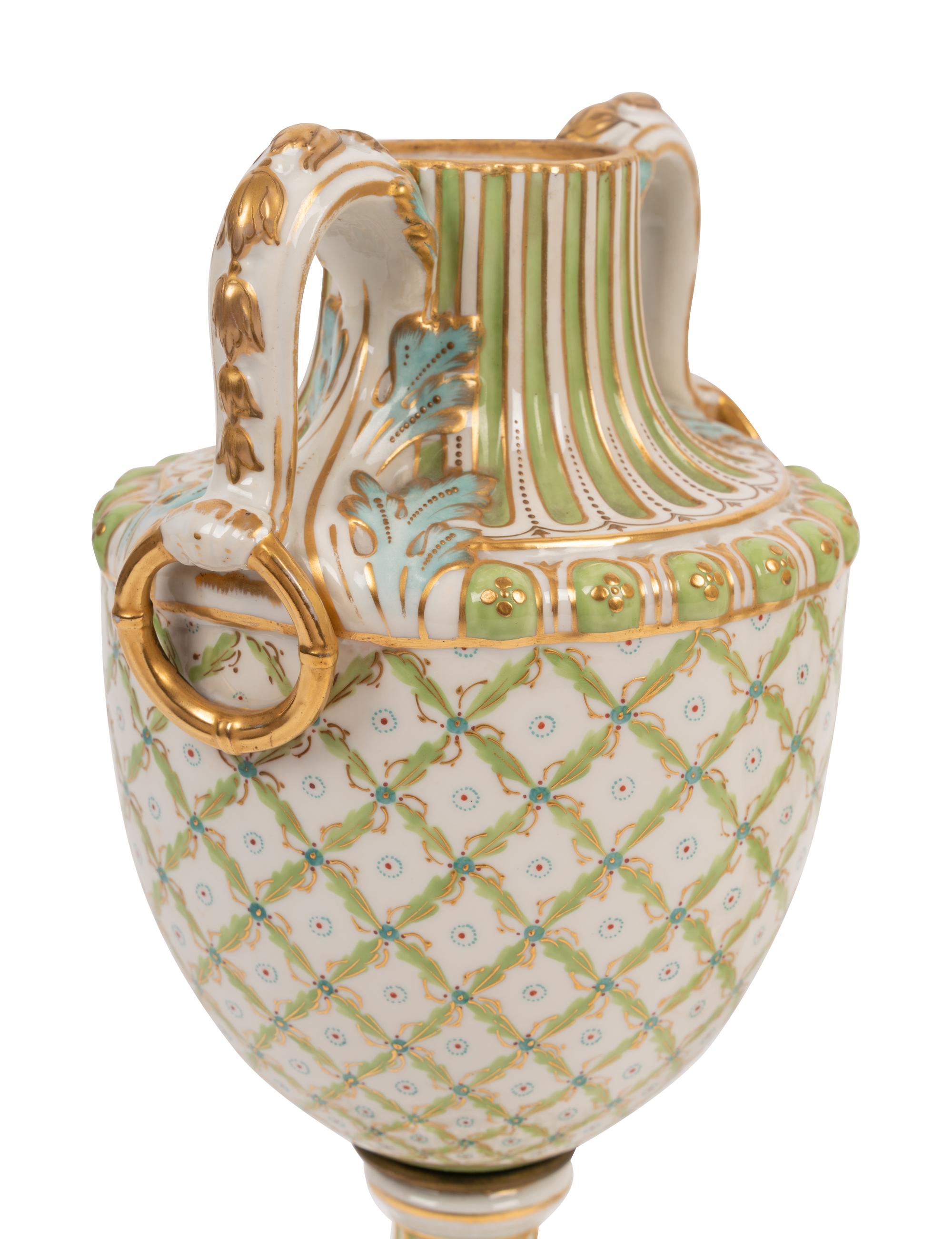 A Pair of Sèvres Style Porcelain Urns