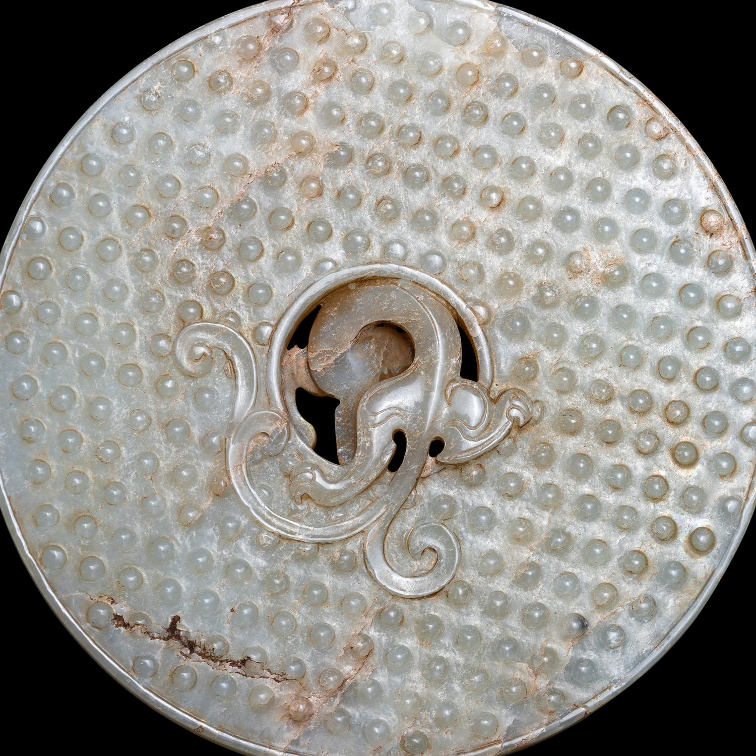 A Chinese Pale Celadon Jade 'Chilong' Bi Disk 青玉螭龍紋璧