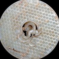 A Chinese Pale Celadon Jade 'Chilong' Bi Disk 青玉螭龍紋璧