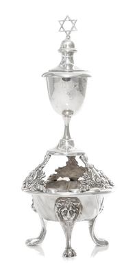A Continental Silver Spice Tower, , having a cup engraved with a Hebrew prayer and toped with the Star of David surmounting a floral an