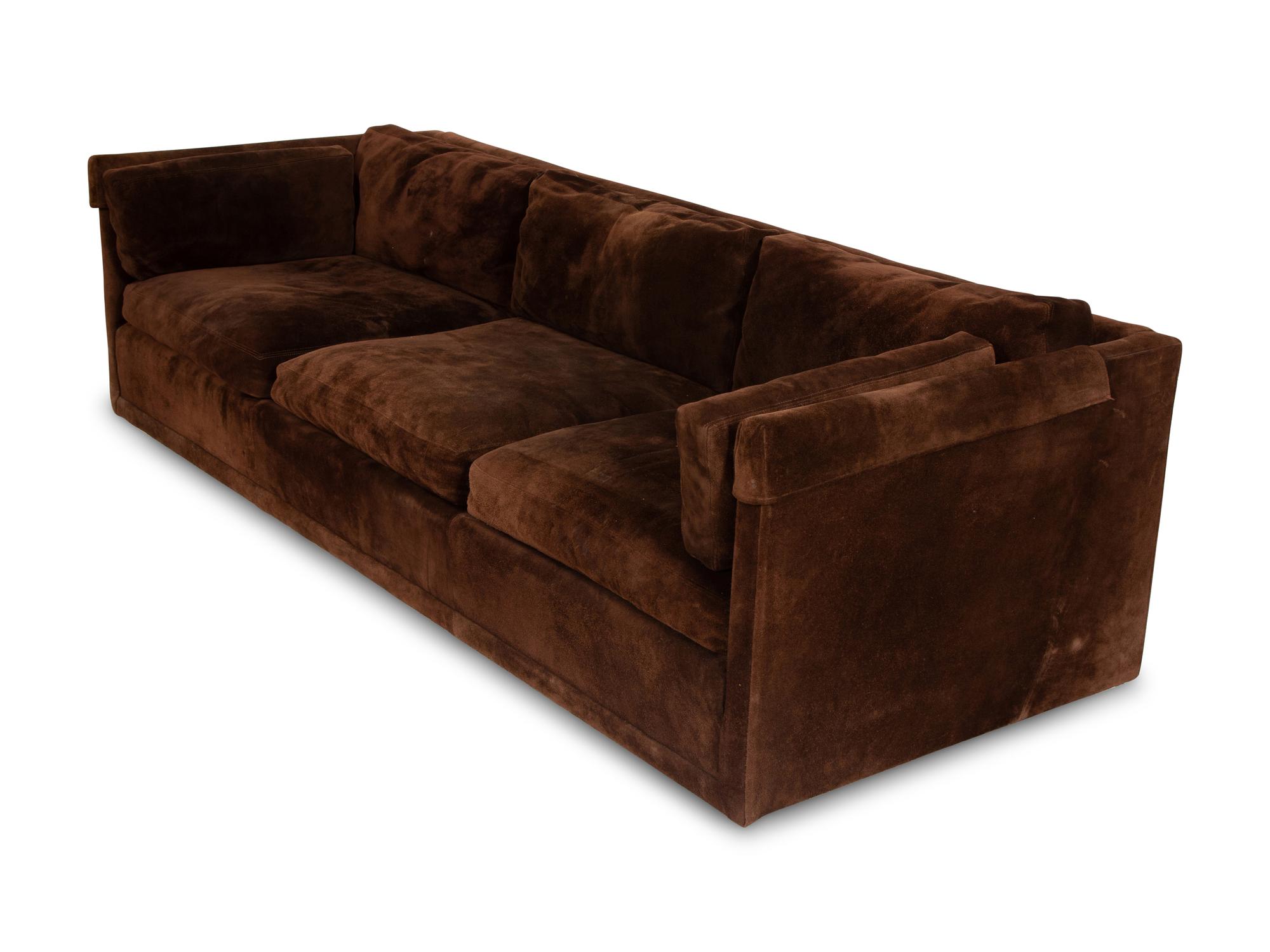 A Chocolate Suede-Upholstered Three-Cushion Sofa