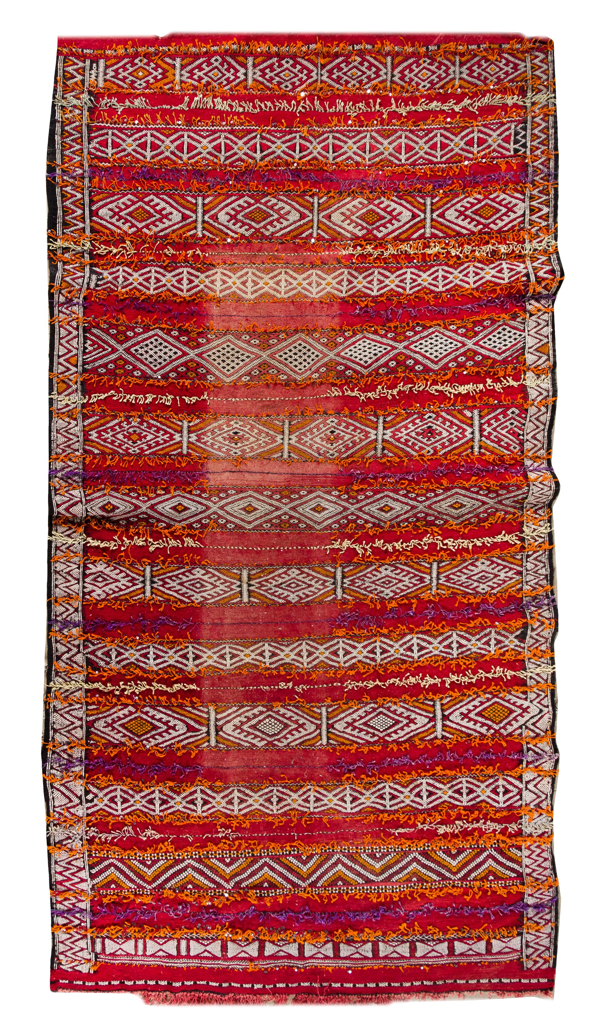 An Afghan Wool Rug 10 feet 1 inch x 5 feet 6 inches. — 20TH CENTURY