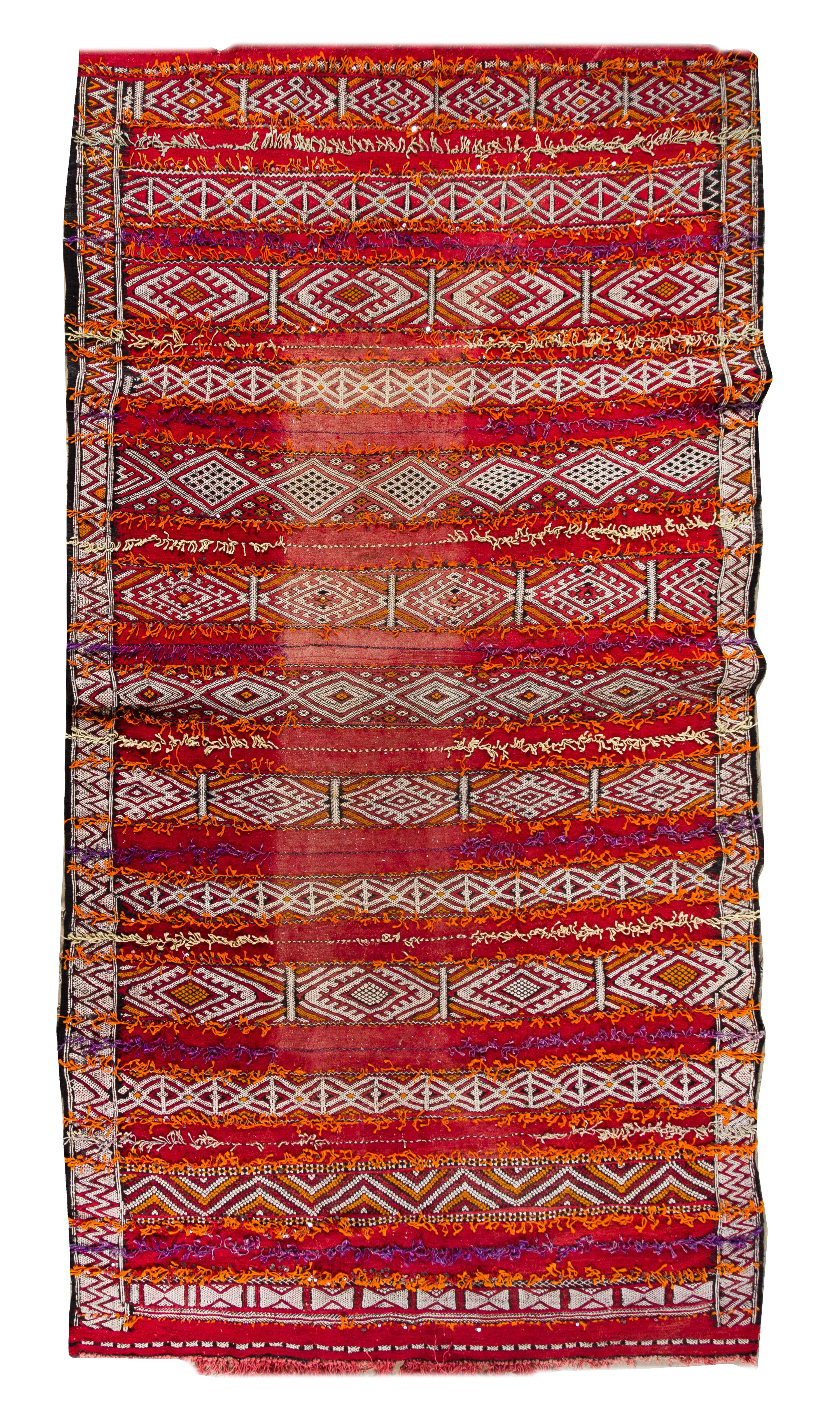 An Afghan Wool Rug 10 feet 1 inch x 5 feet 6 inches. — 20TH CENTURY