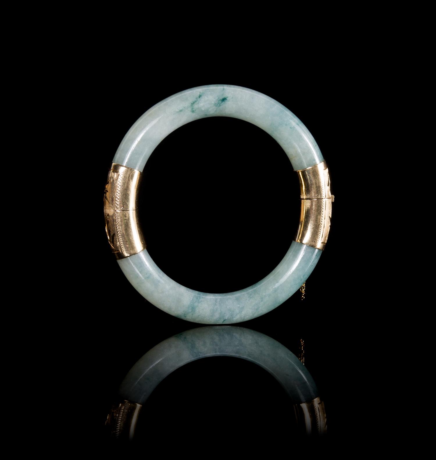 A 14K Gold Mounted Apple Green and Celadon Jadeite Bangle Diameter 3 1/4 (exterior).