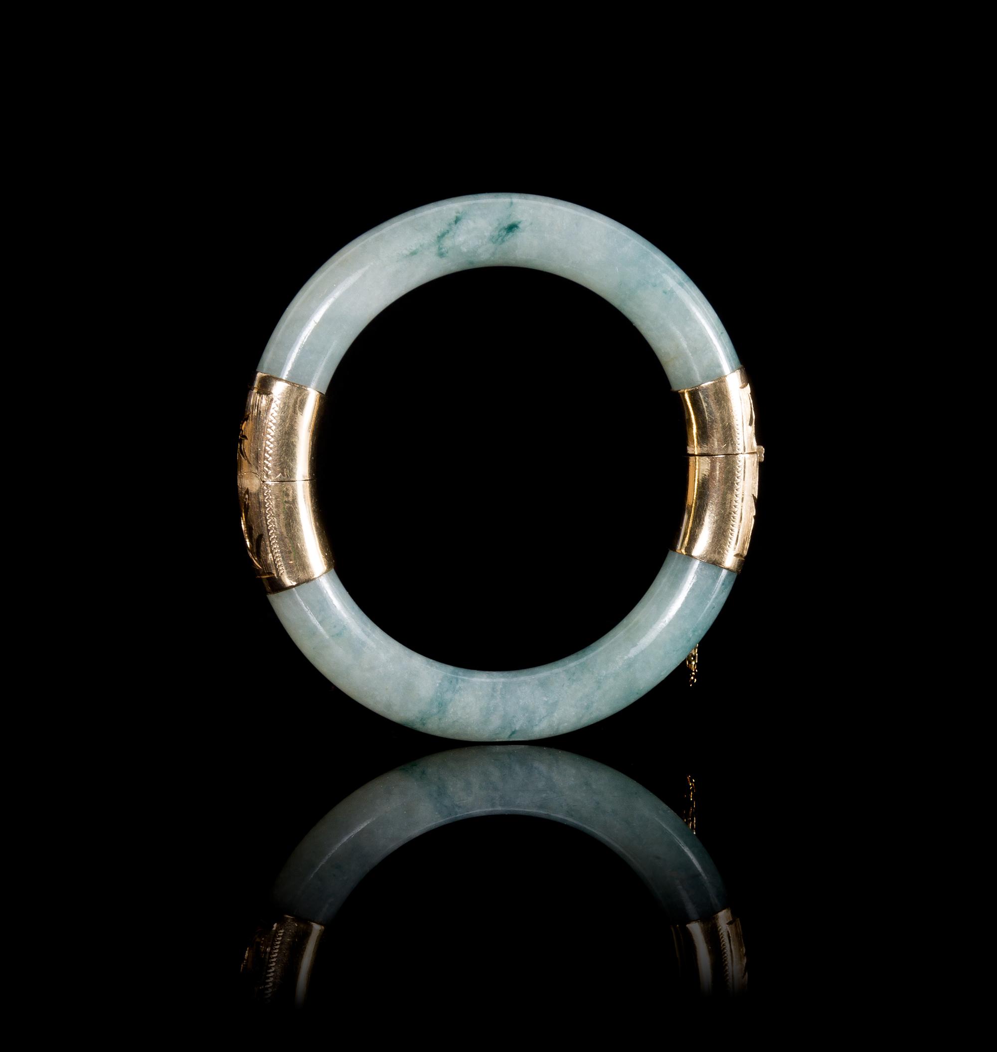 A 14K Gold Mounted Apple Green and Celadon Jadeite Bangle Diameter 3 1/4 (exterior).