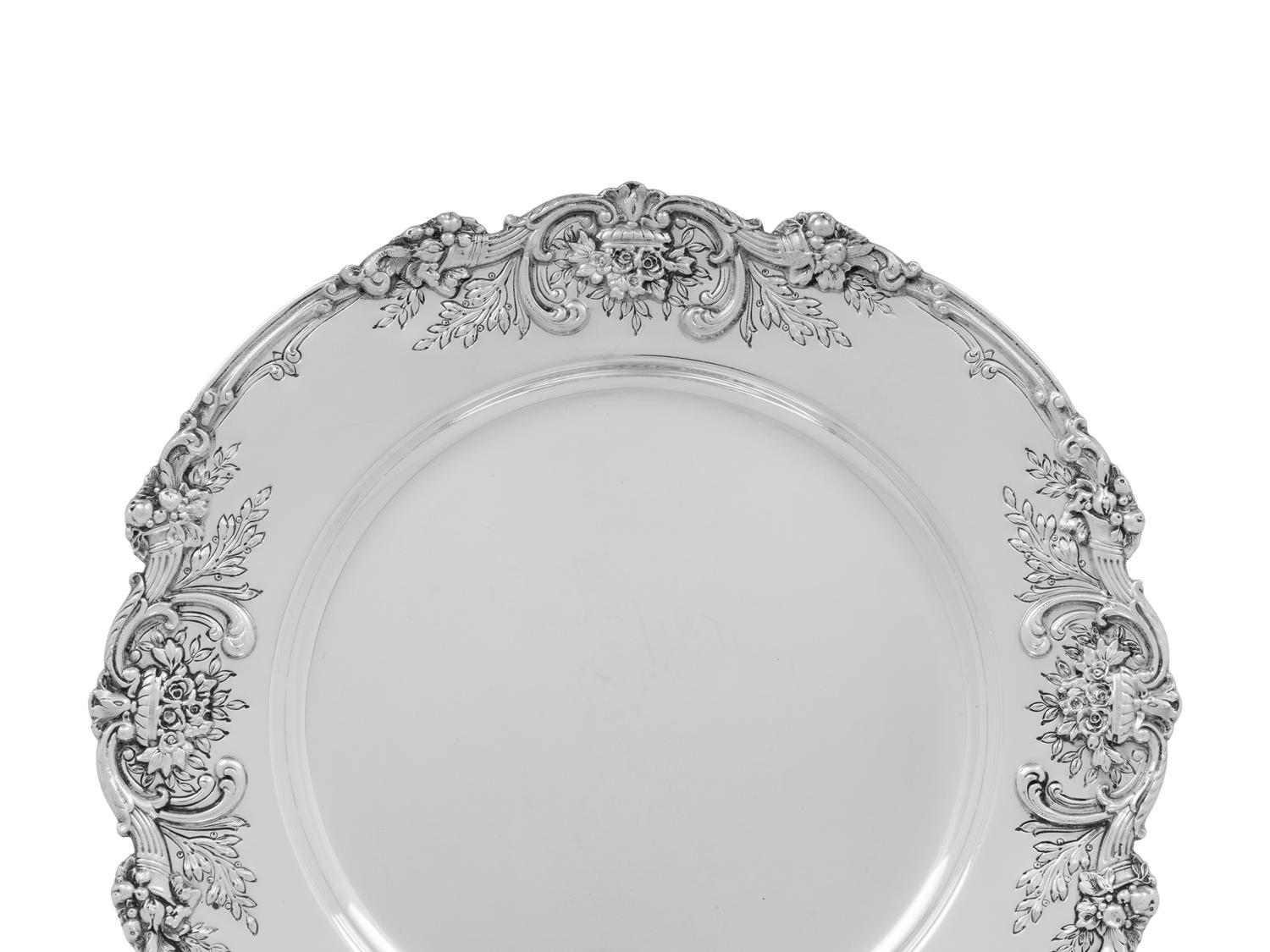 A Set of Twelve American Silver Francis I Dinner Plates