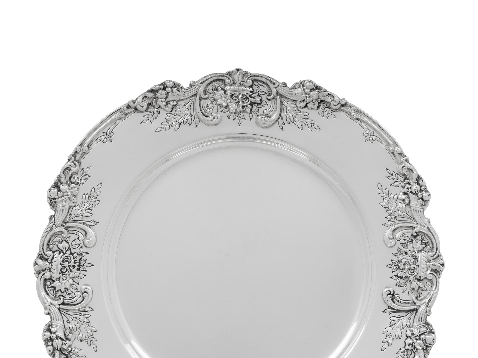 A Set of Twelve American Silver Francis I Dinner Plates