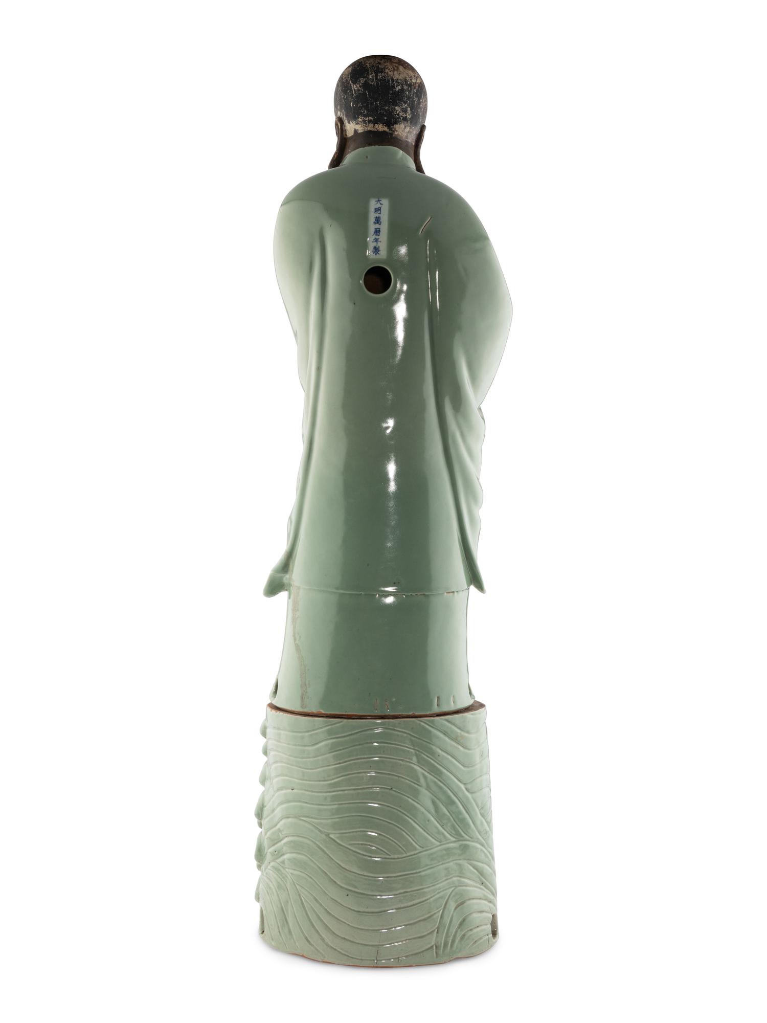 A Large Chinese Celadon Glazed Porcelain Figure of Damo