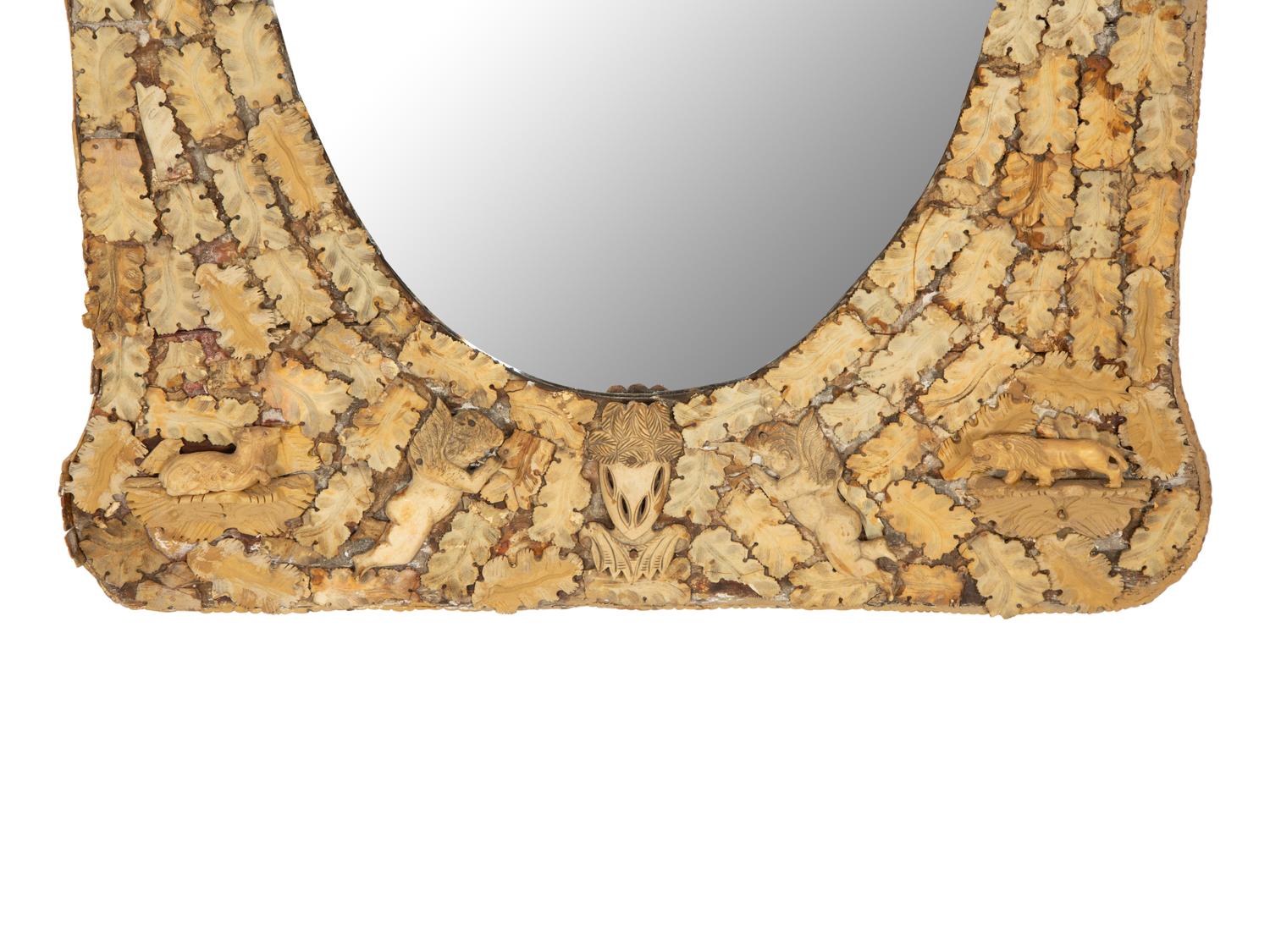 A Continental Carved Bone Mirror