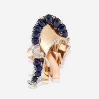 A Retro sapphire, diamond, and fourteen karat gold brooch circa 1940s