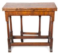 A George III Walnut Games Table Height 29 x width 30 x depth 12 3/4 inches. — ENGLISH, 18TH CENTURY