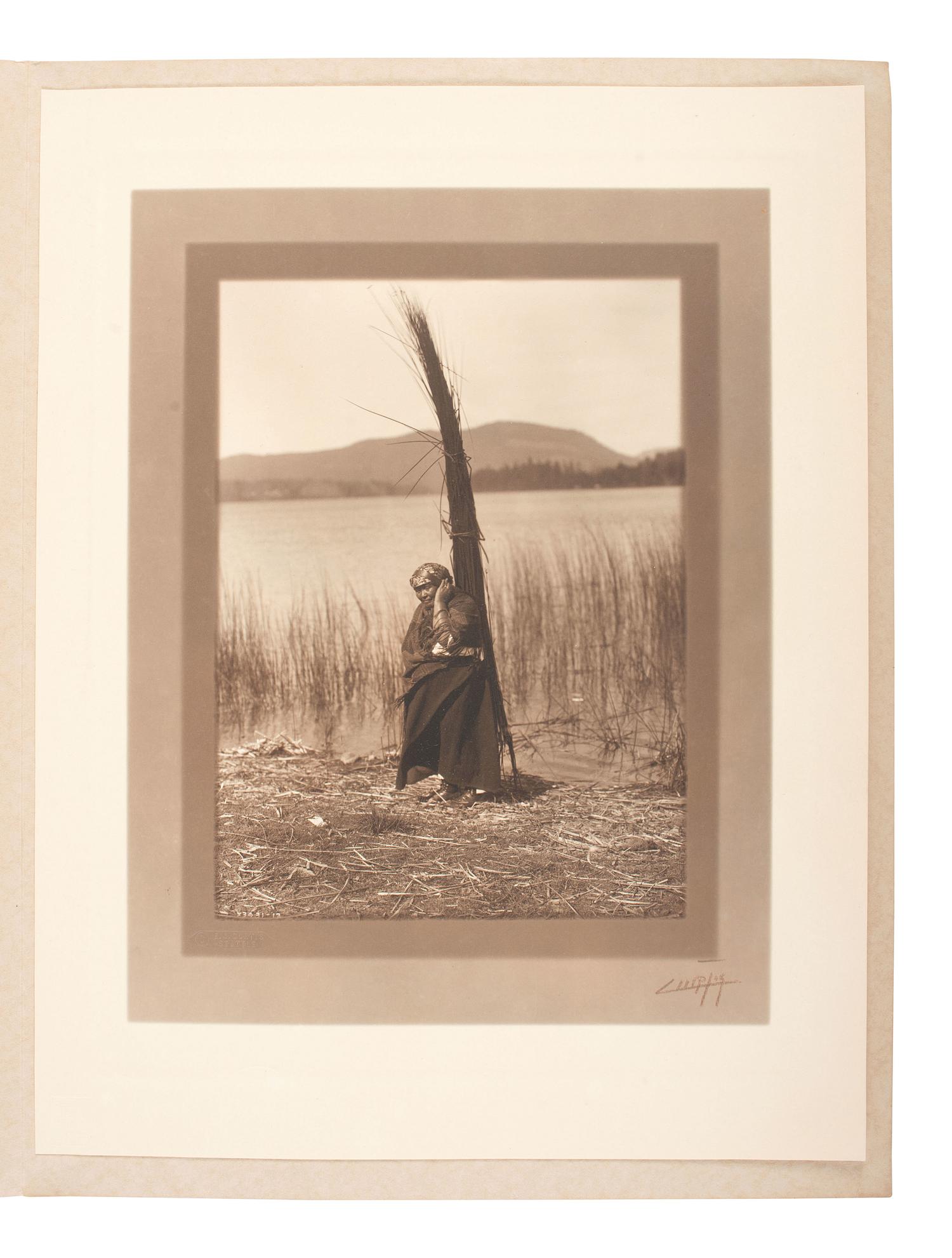 [NATIVE AMERICANS]. CURTIS, Edward S. (1868-1952), photographer. The Head Strap, Cowichan. 1912.