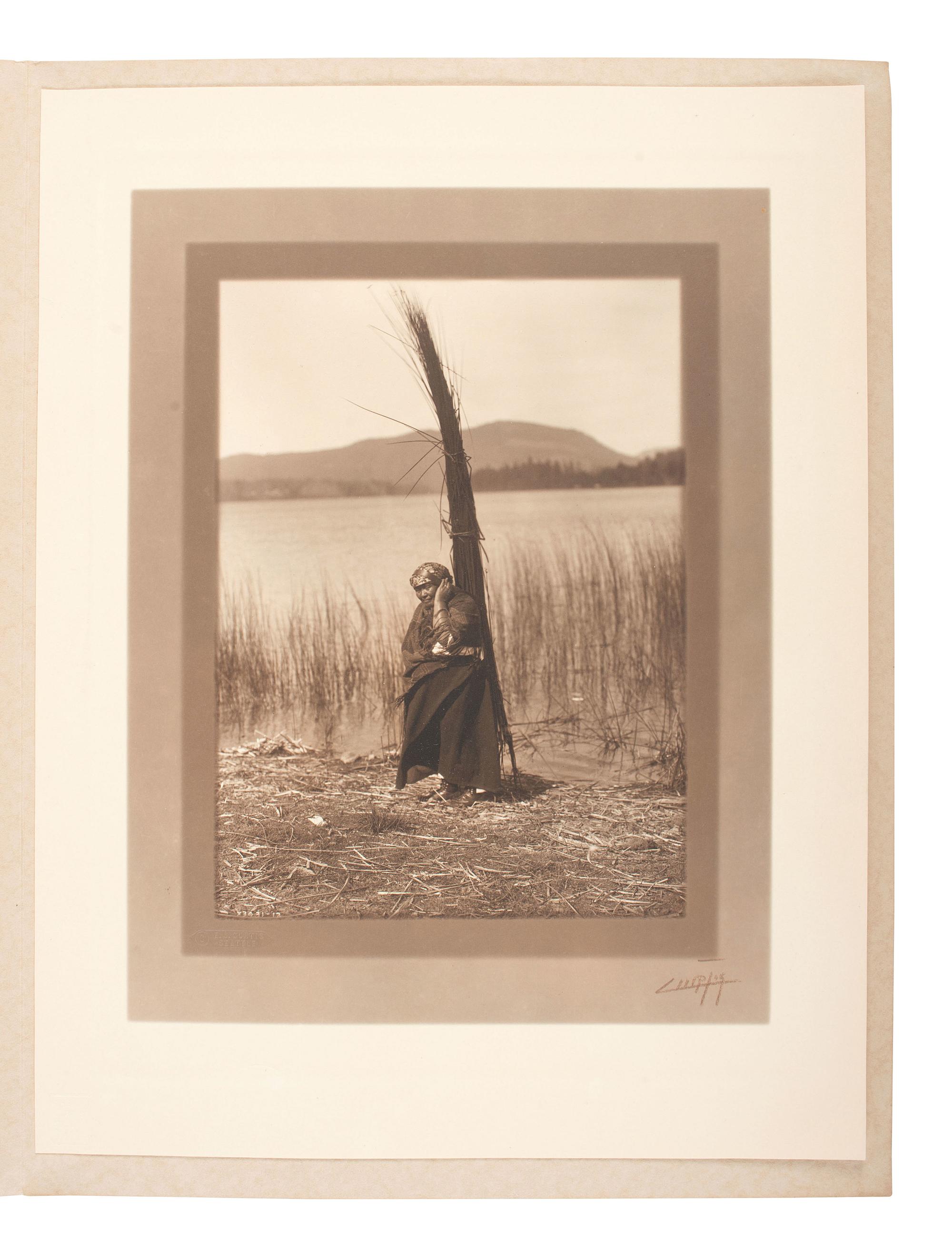 [NATIVE AMERICANS]. CURTIS, Edward S. (1868-1952), photographer. The Head Strap, Cowichan. 1912.