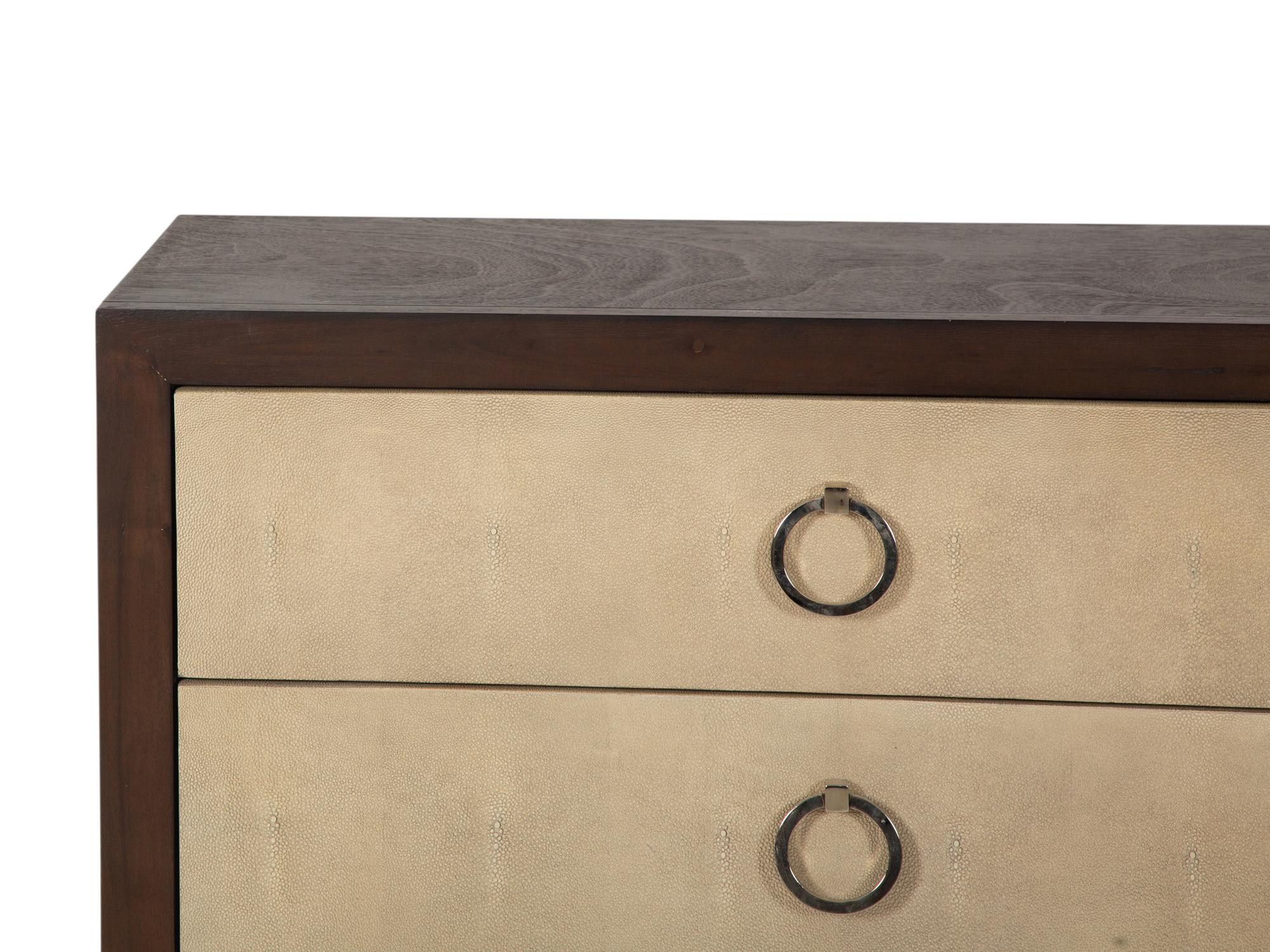A Pair of Faux Shagreen and Stained Oak Three-Drawer Commodes