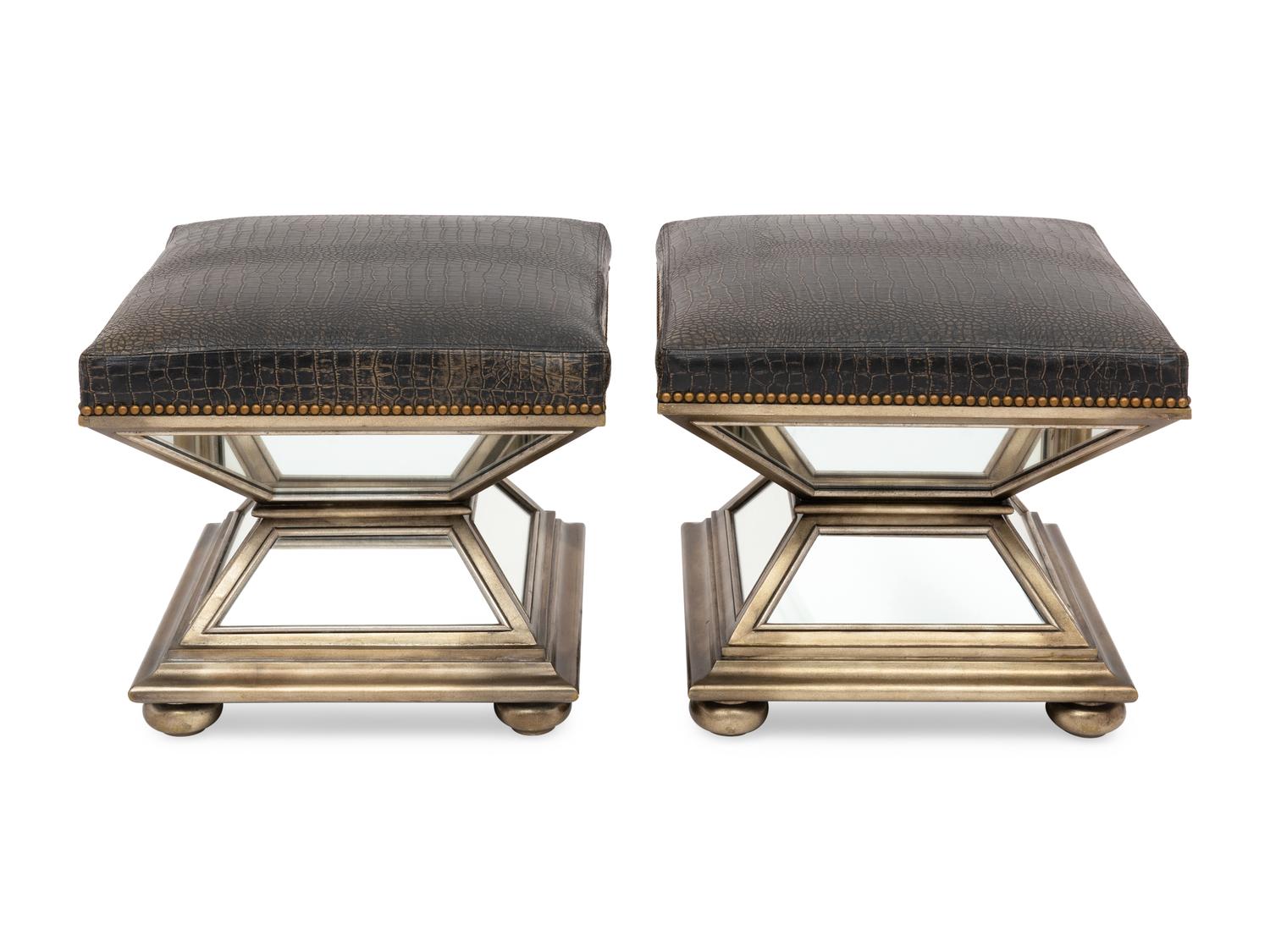 A Pair of Silvered and Mirrored Hourglass Stools