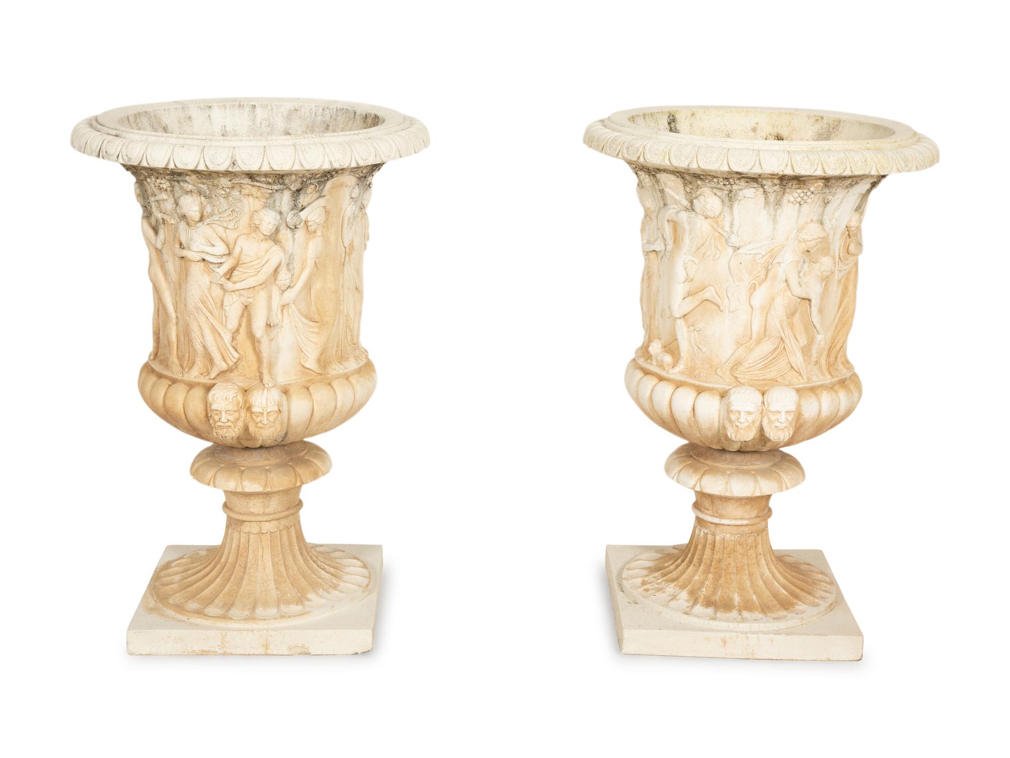 A Pair of Cast Stone Campana Urns