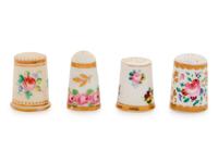 Four English Painted and Parcel Gilt Porcelain Thimbles