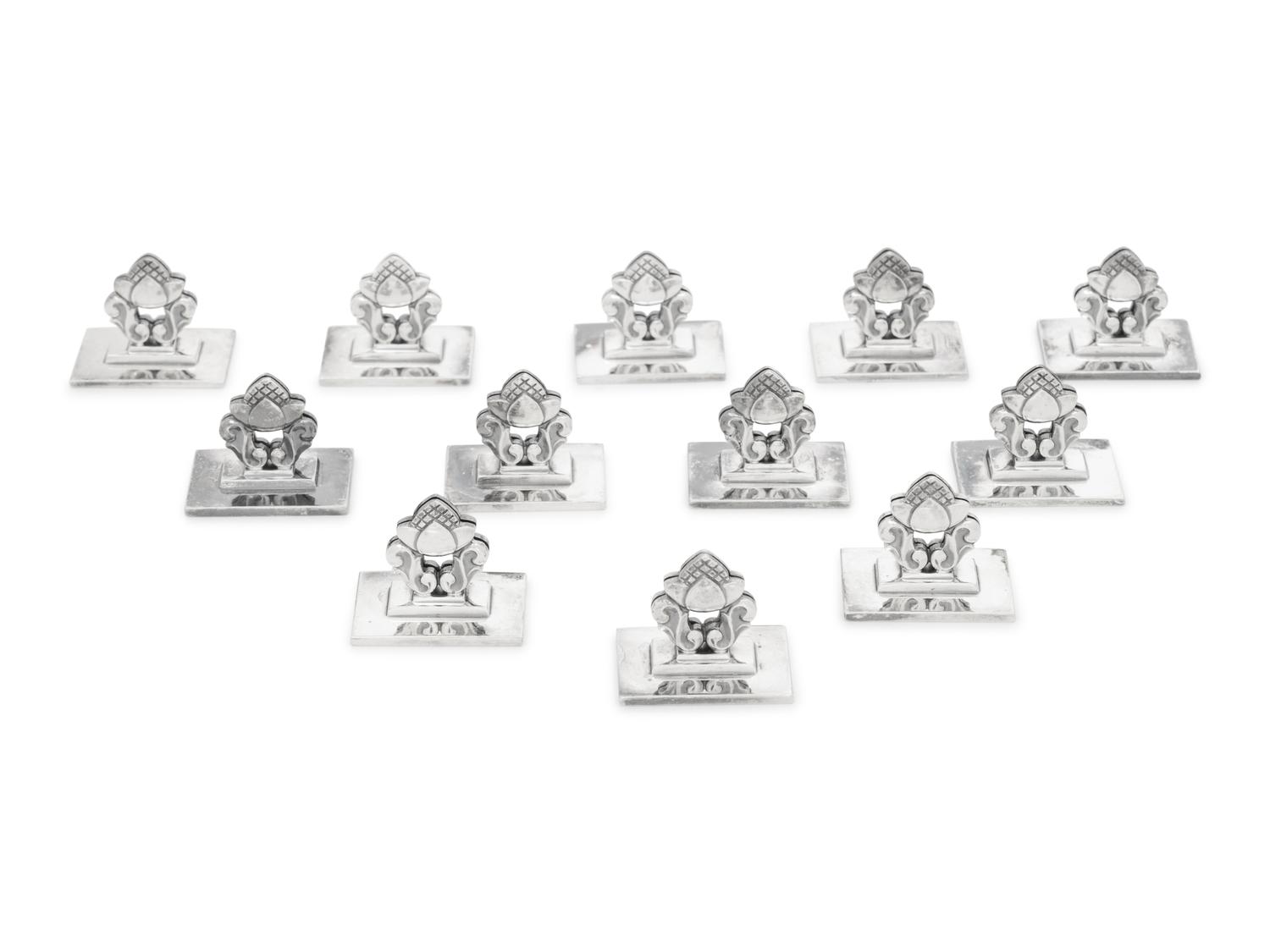 A Set of Twelve Georg Jensen Silver Acorn Place Card Holders