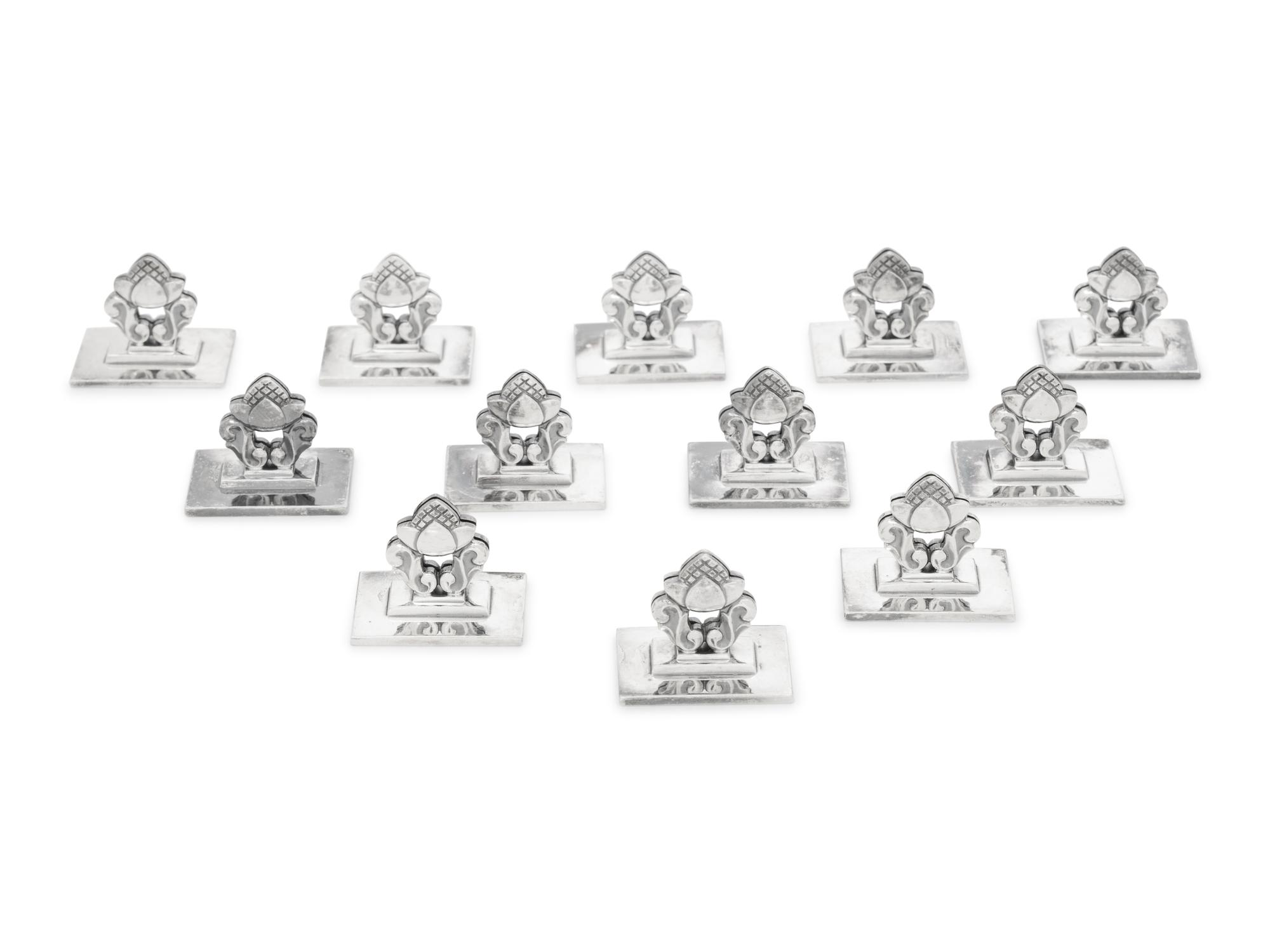 A Set of Twelve Georg Jensen Silver Acorn Place Card Holders