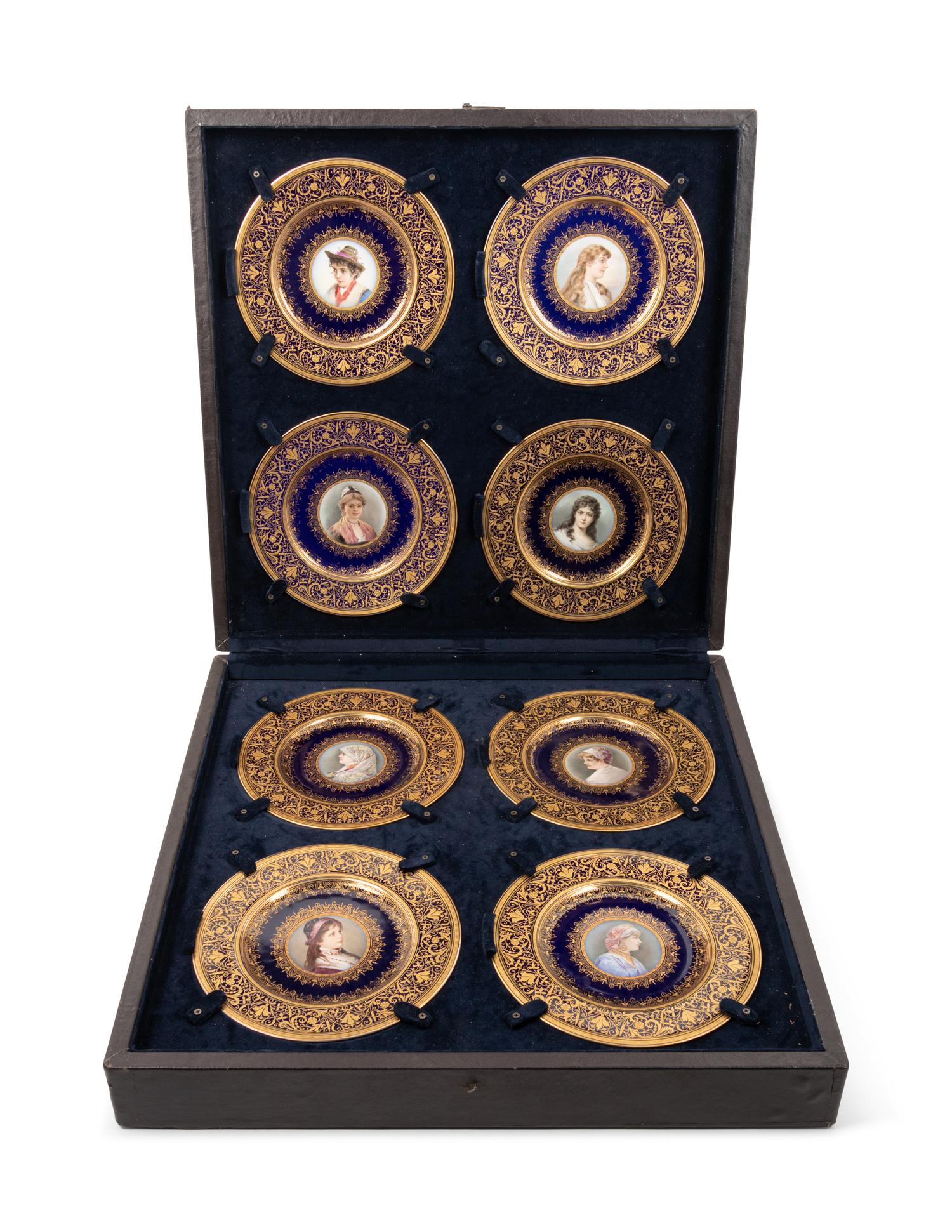A Cased Set of Eight Vienna Style (Fischer & Mieg) Porcelain Portrait Plates
