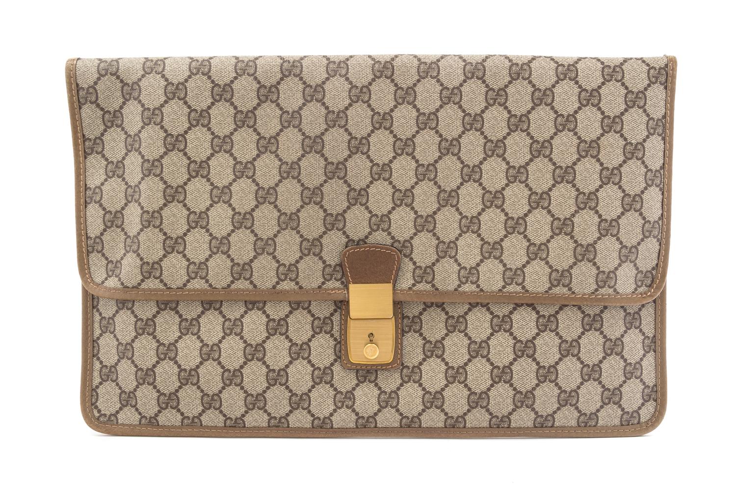 A Gucci Monogram Canvas Folio, 16" x 10".