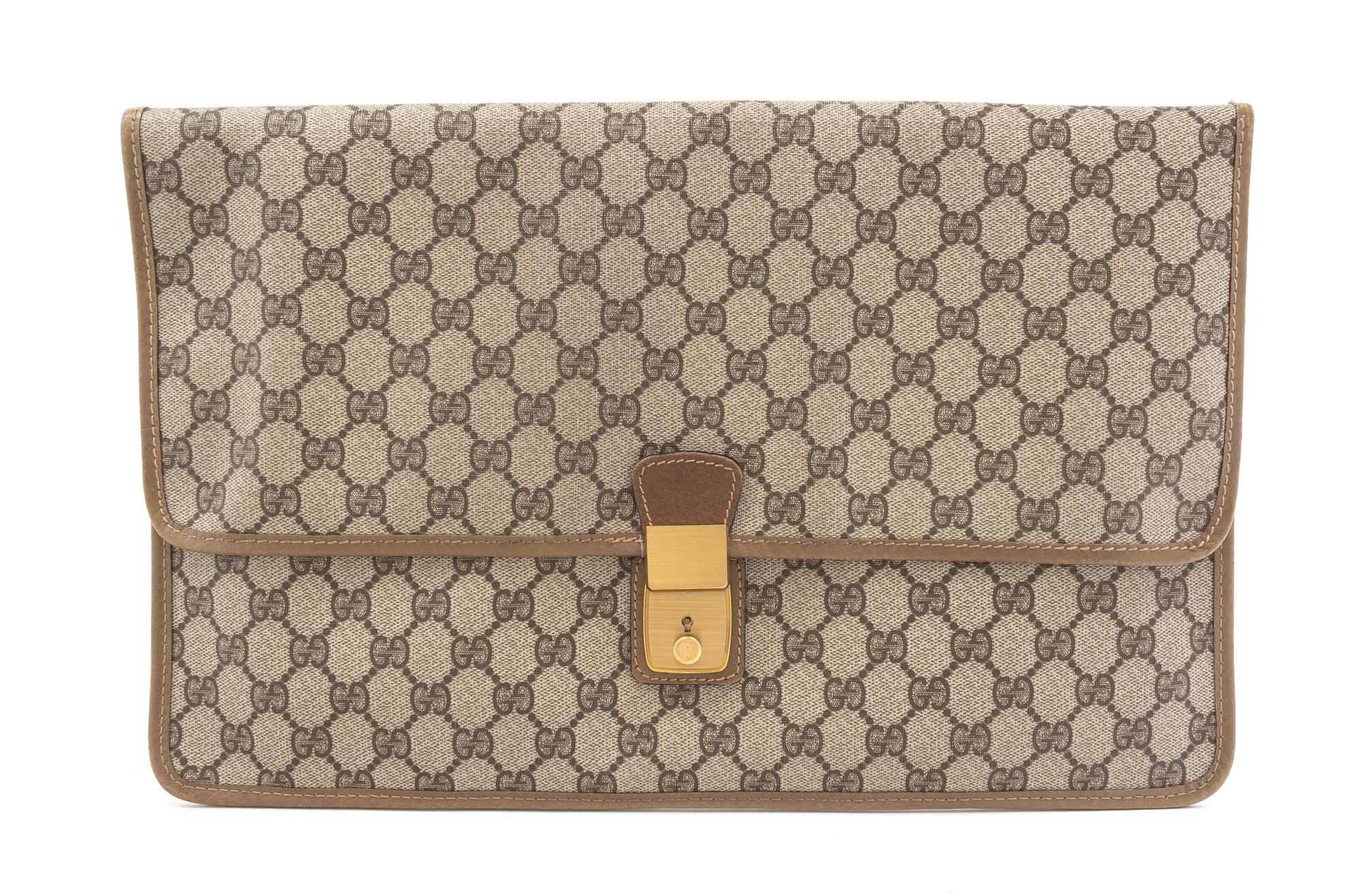 A Gucci Monogram Canvas Folio, 16" x 10".