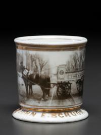 A Dry Goods Store Proprietor's Porcelain Occupational Shaving Mug Belonging to John E. Schuon