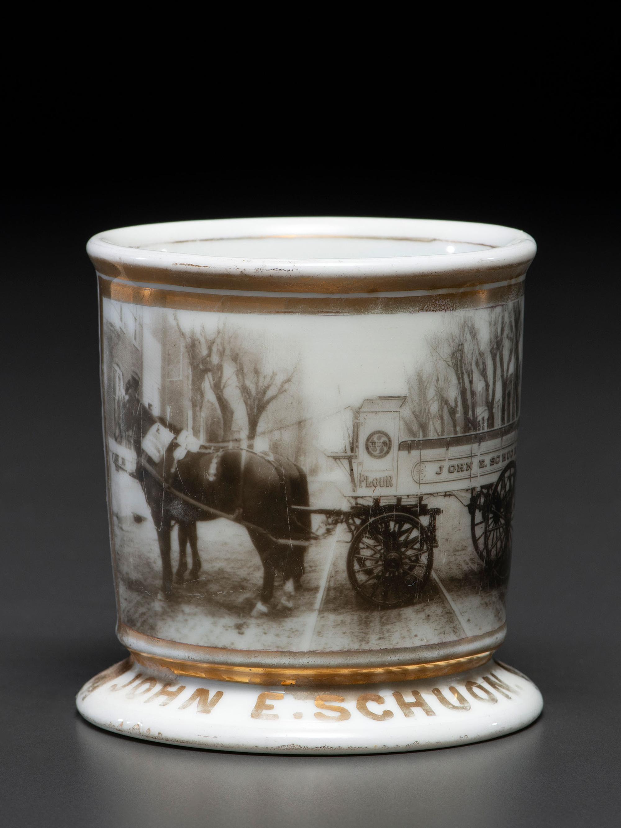A Dry Goods Store Proprietor's Porcelain Occupational Shaving Mug Belonging to John E. Schuon