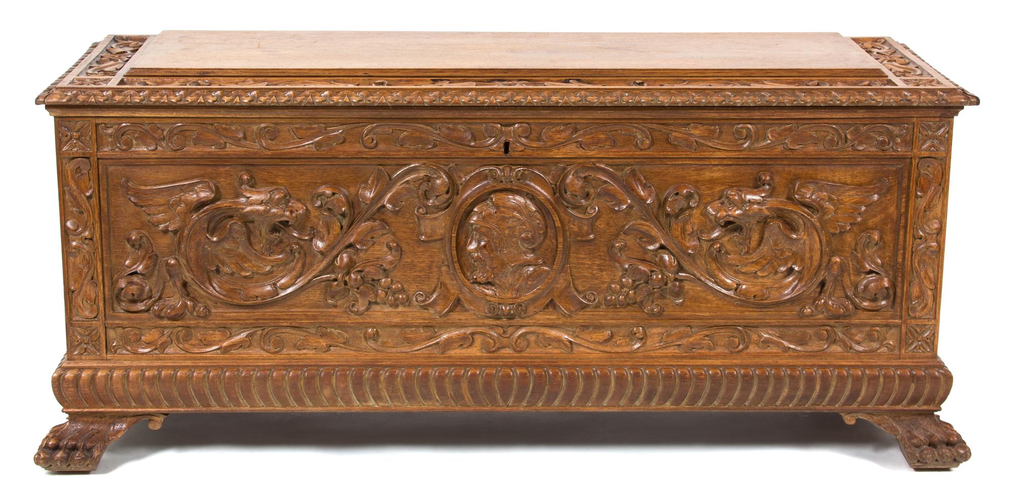 A Jacobean Style Carved Mahogany Cassone Height 22 x width 49 x depth 17 inches. — 20TH CENTURY