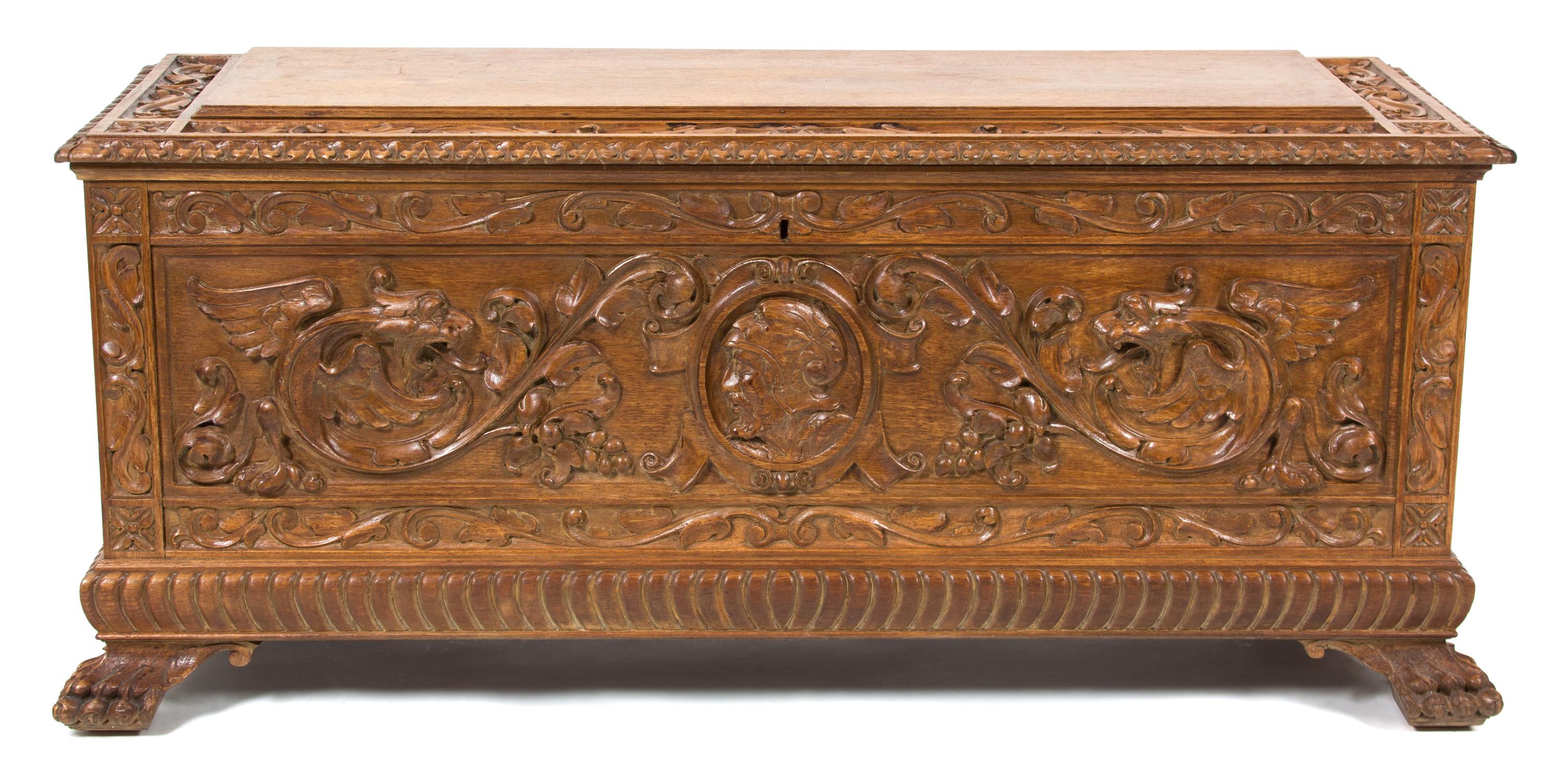 A Jacobean Style Carved Mahogany Cassone Height 22 x width 49 x depth 17 inches. — 20TH CENTURY