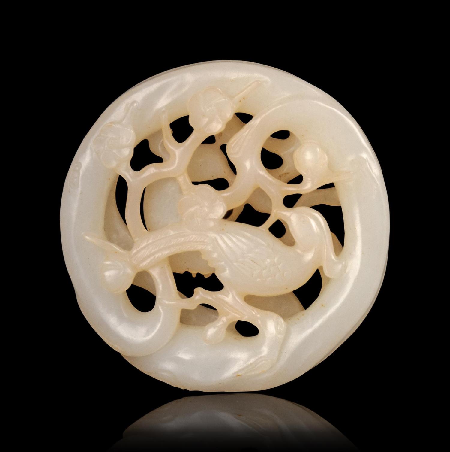 A Carved White Jade Pendant
