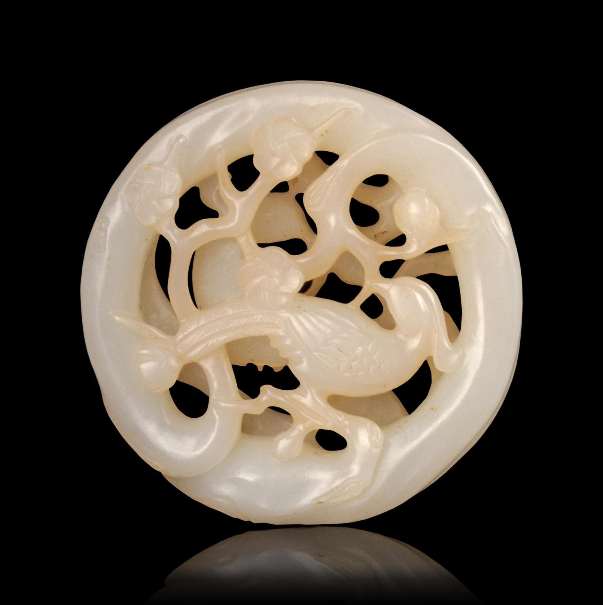 A Carved White Jade Pendant
