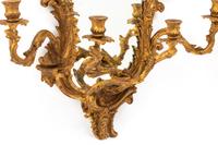 A Pair of Italian Carved Giltwood Girandole Mirrors