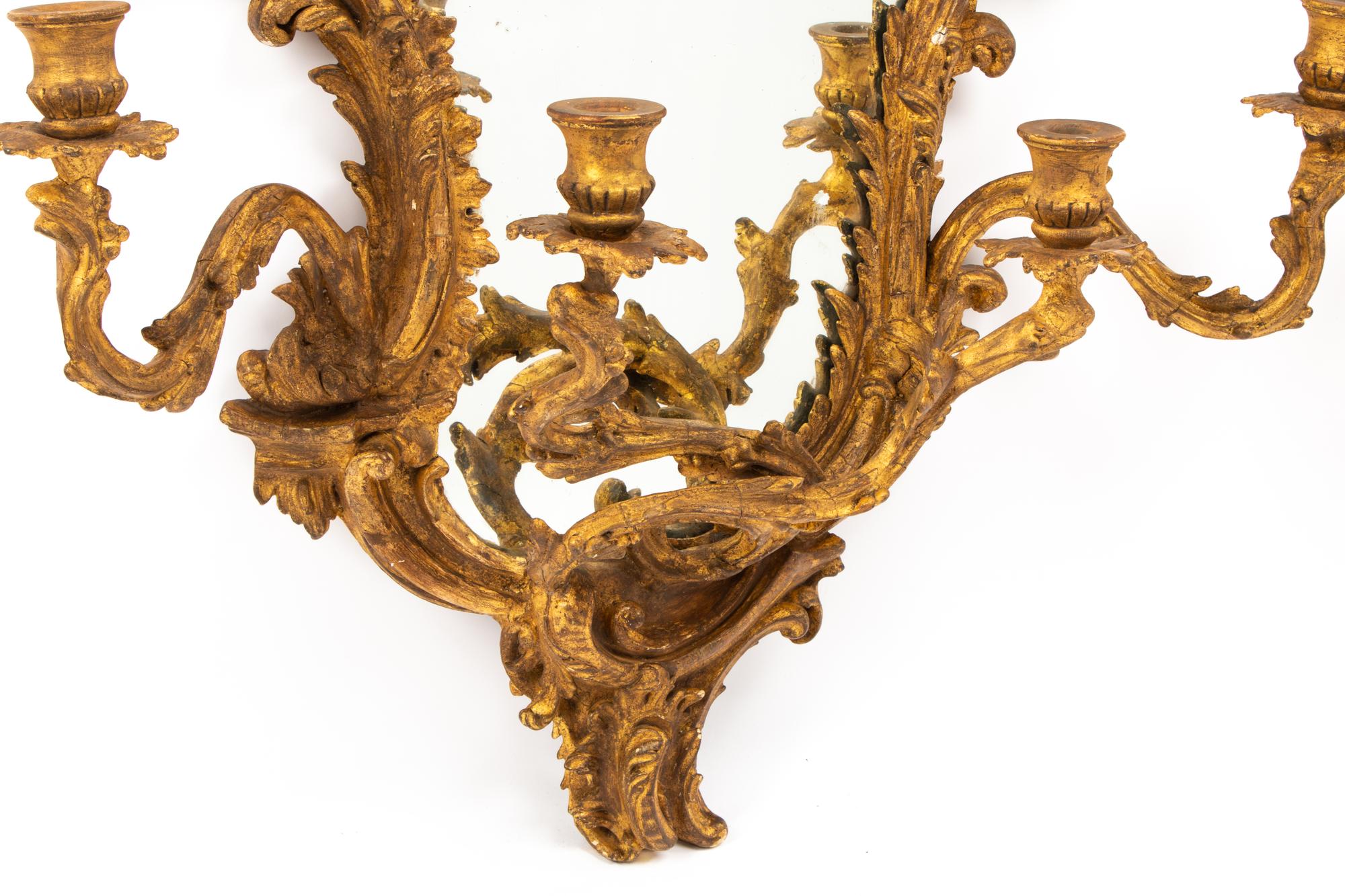 A Pair of Italian Carved Giltwood Girandole Mirrors
