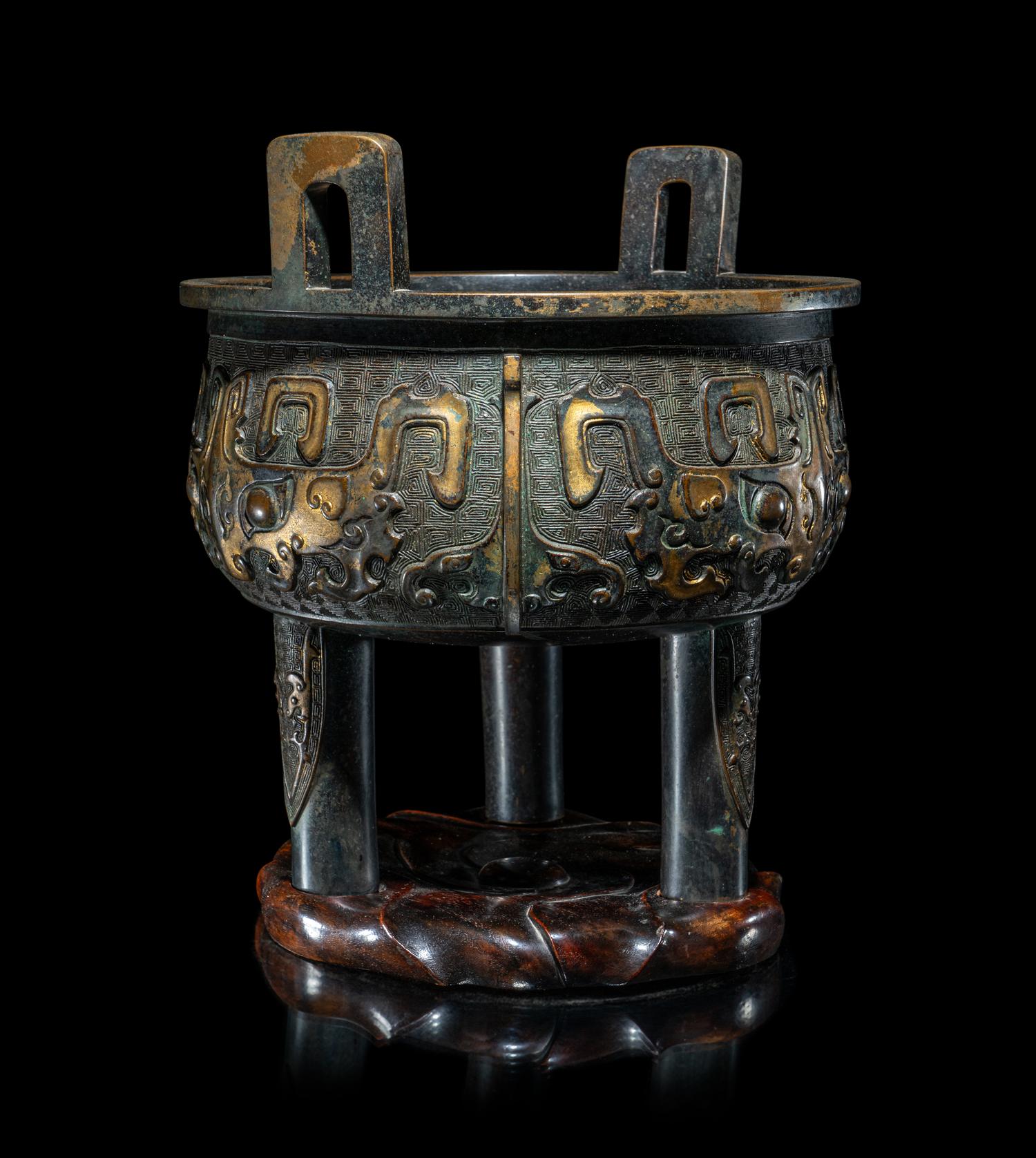 A Chinese Parcel Gilt Archaistic Bronze Bronze Ding Vessel