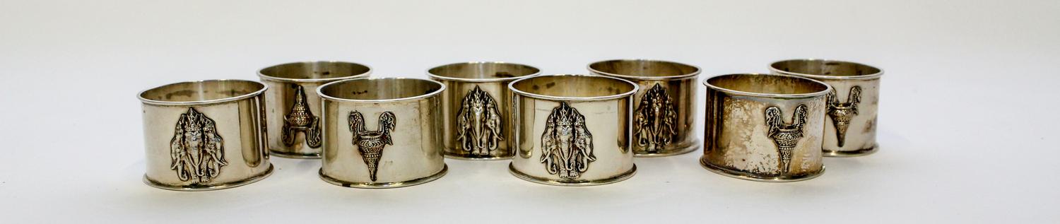 A Set of Eight Thai Silver Napkin Rings Diameter 1 3/4 inches.
