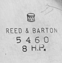 An American Silver Pitcher, Reed & Barton, Taunton, MA, 1950, having a paneled handle and a stepped foot.