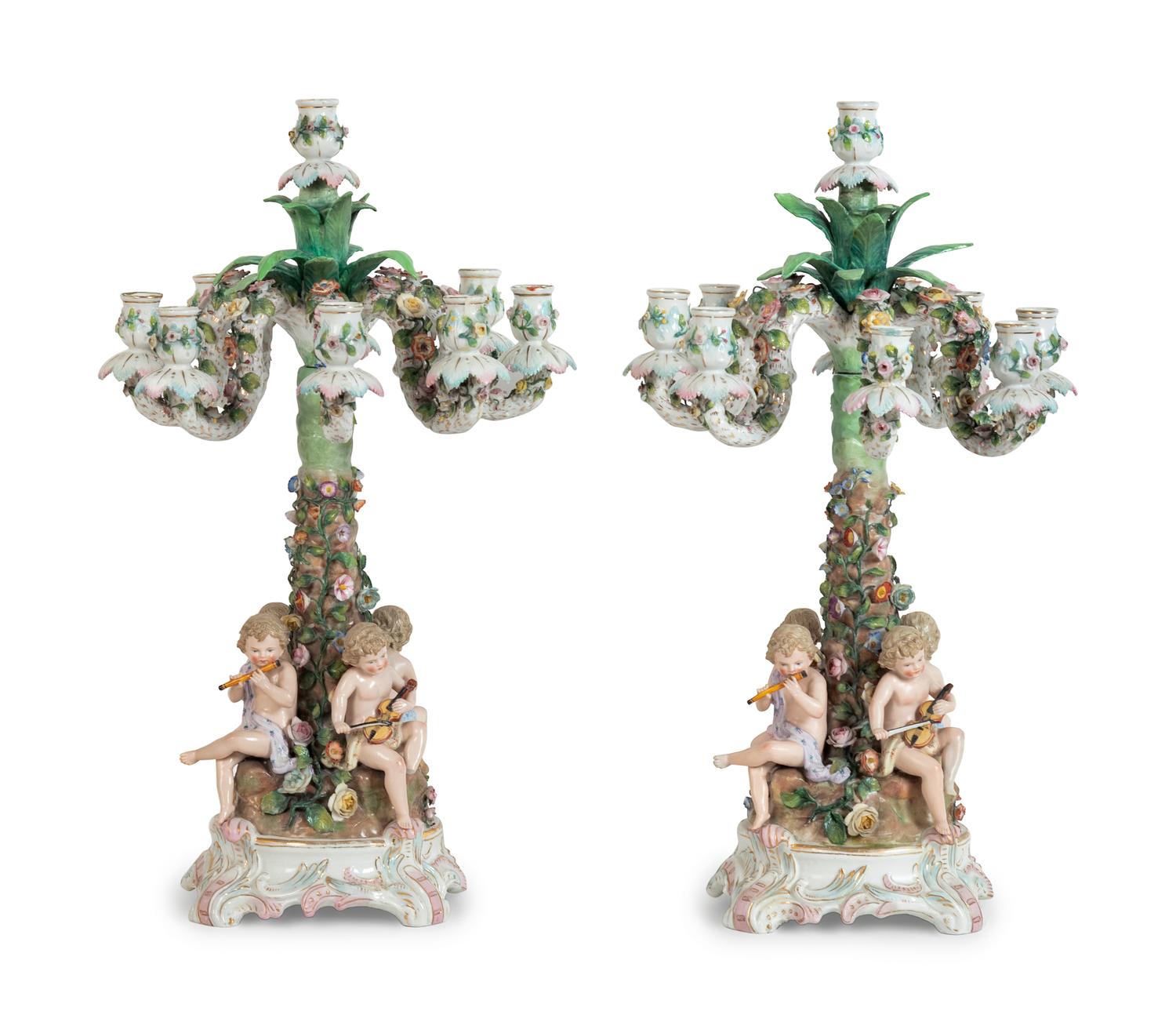 A Pair of Continental Porcelain Figural Candelabra