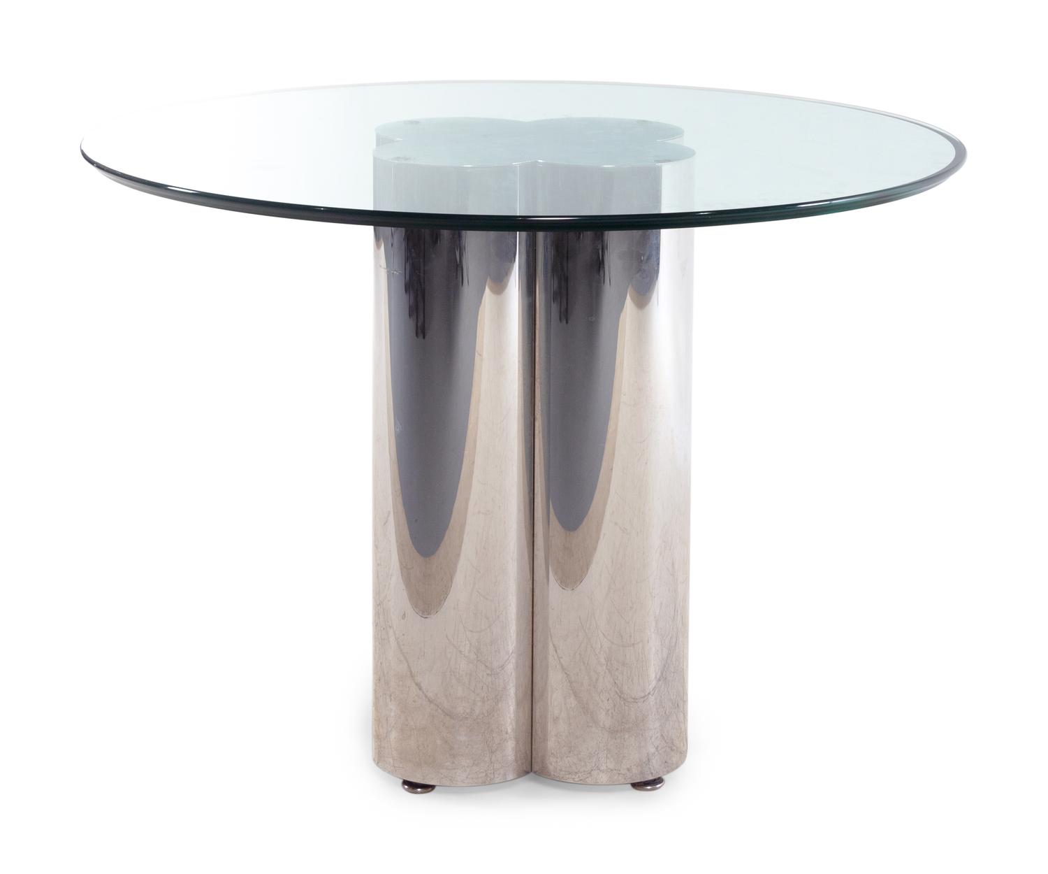 A Polished Chrome Dining Table with a Beveled Glass Top