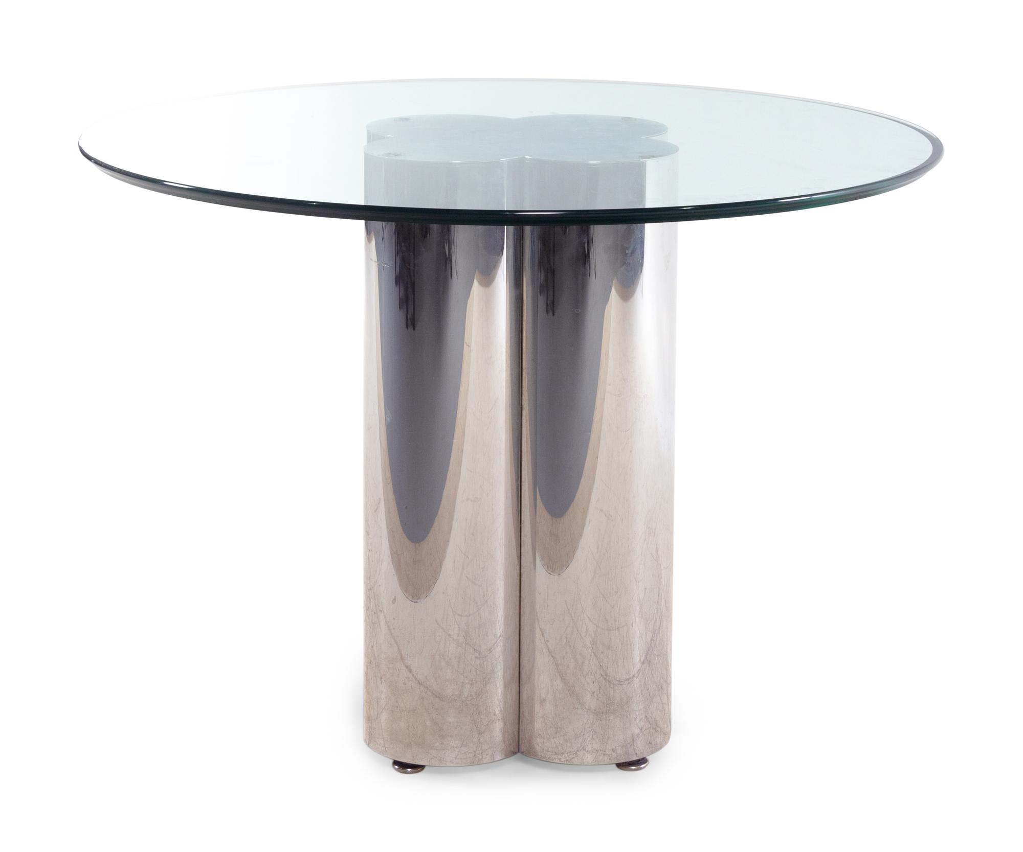A Polished Chrome Dining Table with a Beveled Glass Top