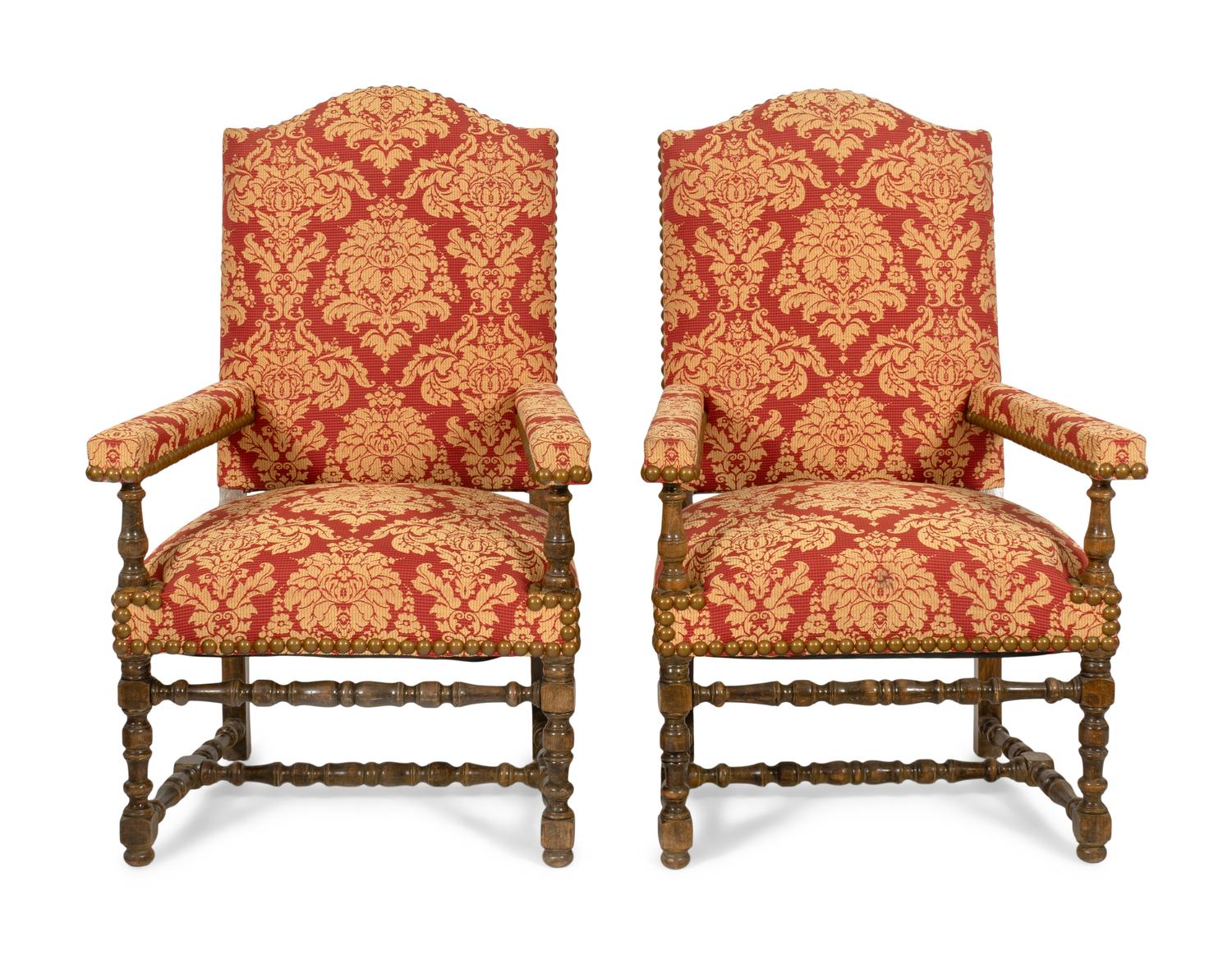 A Pair of Louis XIII Style Damask Upholstered Fauteils
