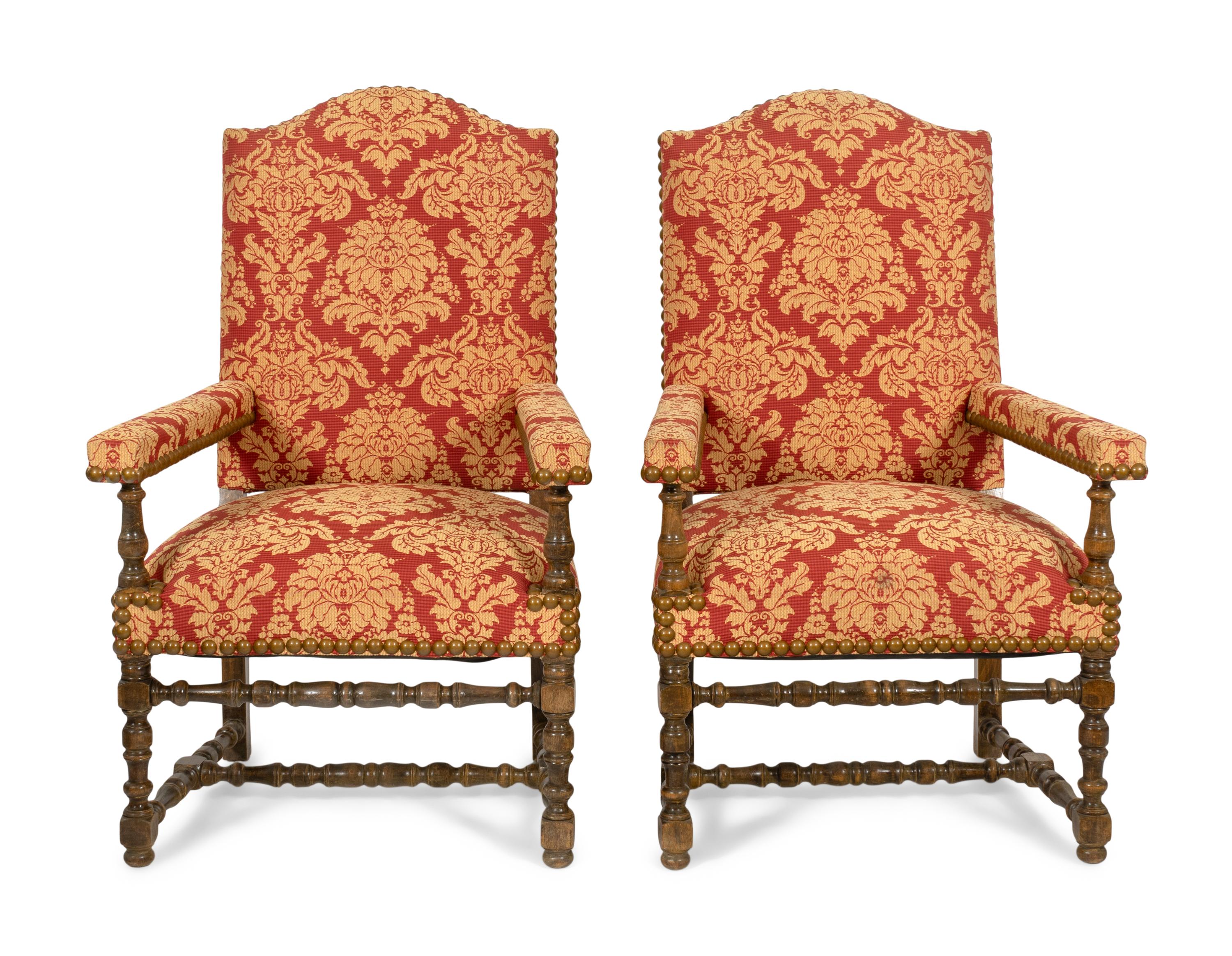 A Pair of Louis XIII Style Damask Upholstered Fauteils