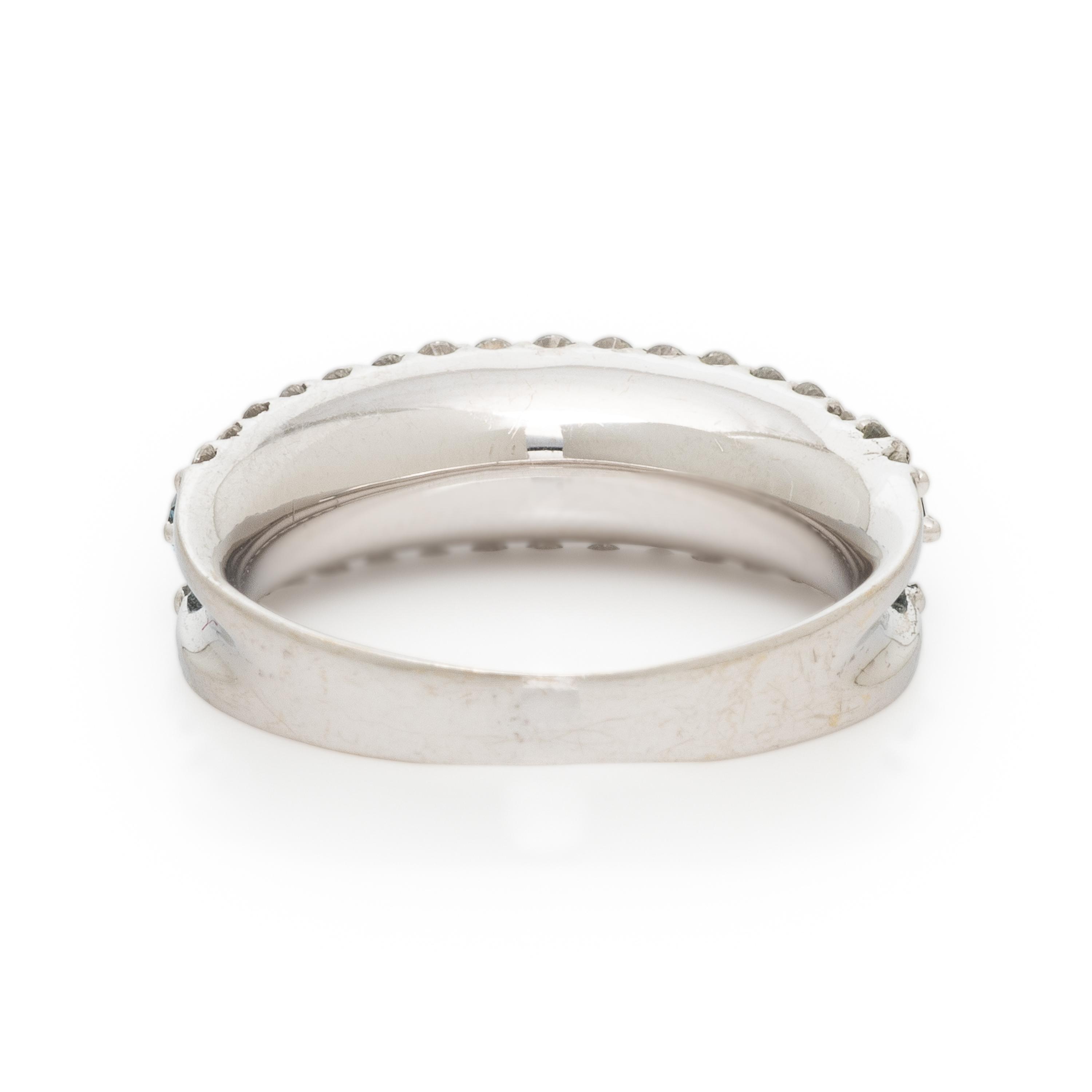 Treated Blue Diamond, Diamond, and White Gold Ring