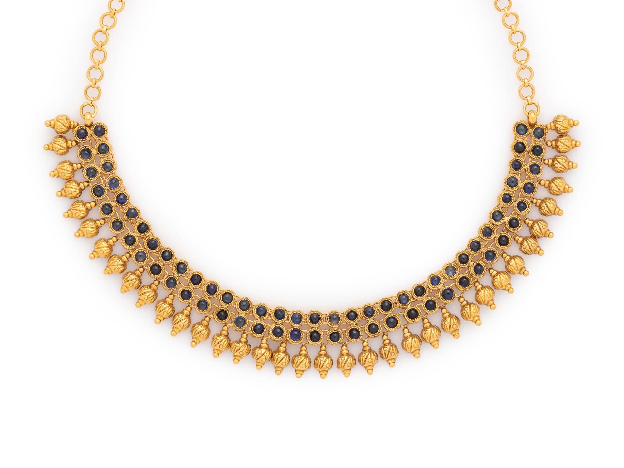HIGH KARAT GOLD AND BLUE STONE NECKLACE