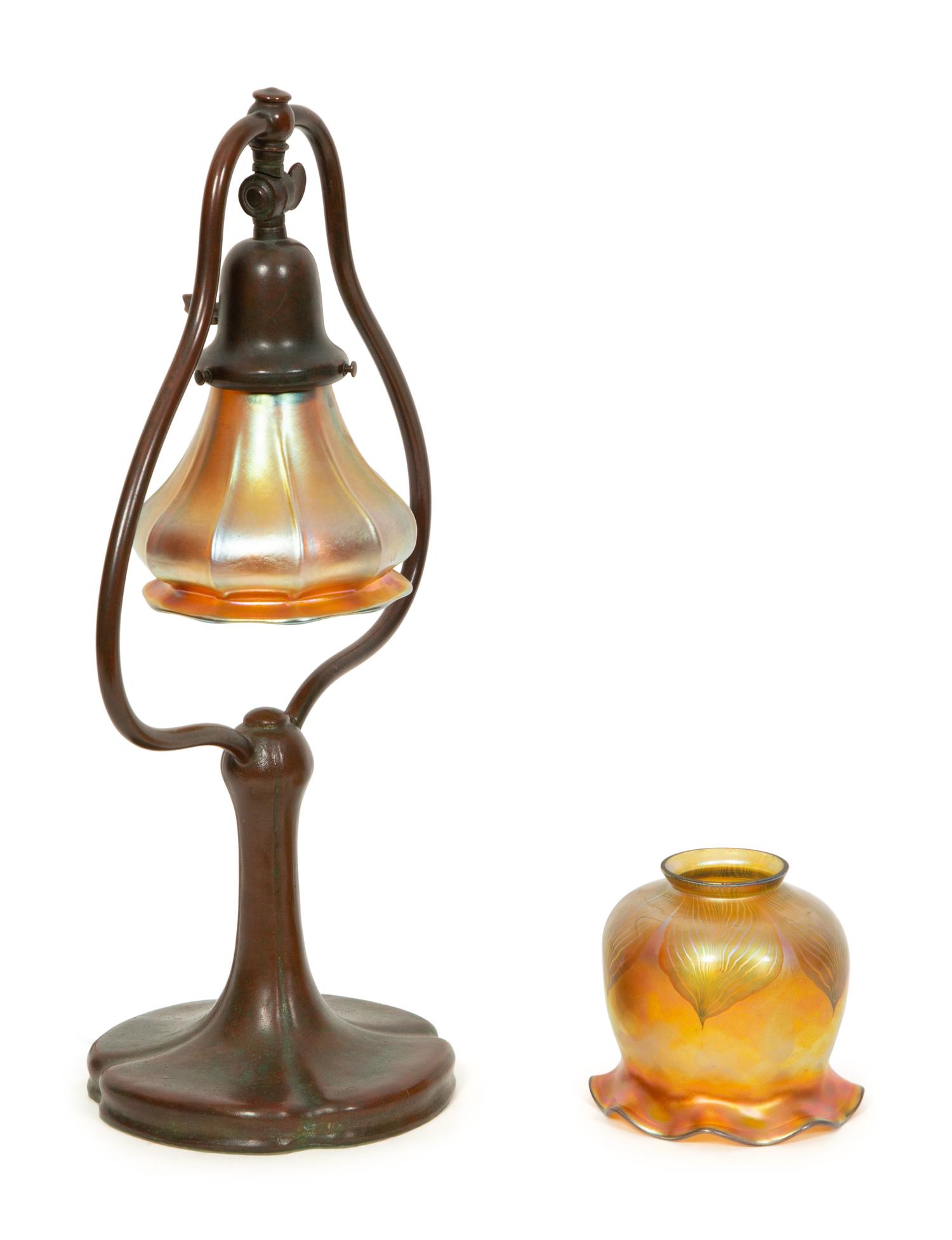 A Handel Bronze Desk Lamp and Two Steuben Aurene Glass Shades