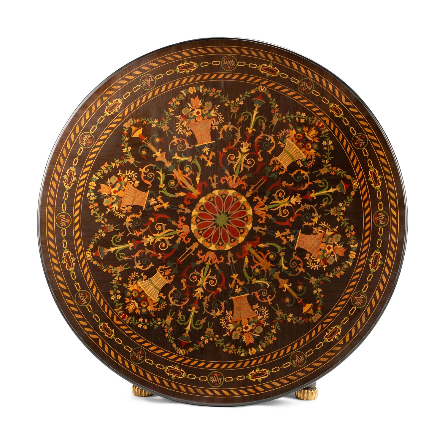 A Continental Parcel Ebonized Marquetry Center Table